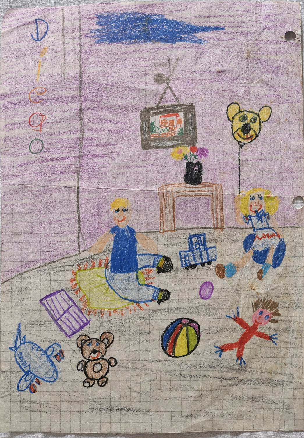 Dibujo infantil de Diego: su nombre en colores, un niño, una niña y juguetes sobre papel de cuadros